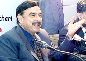 Pakistani Information Minister Sheikh Rashid gestures as he speaks to the press in Islamabad, 01 August 2004. The attempt to kill Pakistan's prime minister-designate could be retaliation for the capture of a key Al-Qaeda suspect in the deadly 1998 bombing of two US embassies in east Africa, Rashid said Sunday. AFP PHOTO/PRESS INFORMATION DEPARTMENT